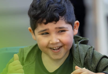Annual review thumbnail feature a smiling boy