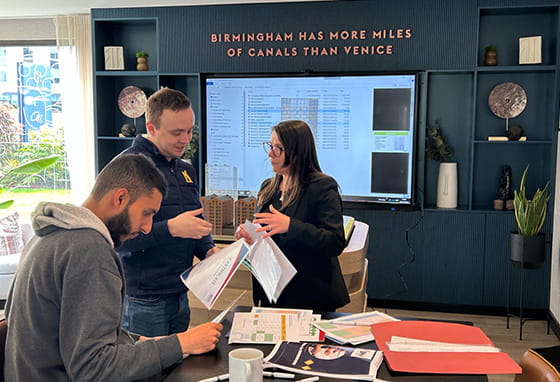 An image of someone from St Joseph talking to someone from Lord Taveners