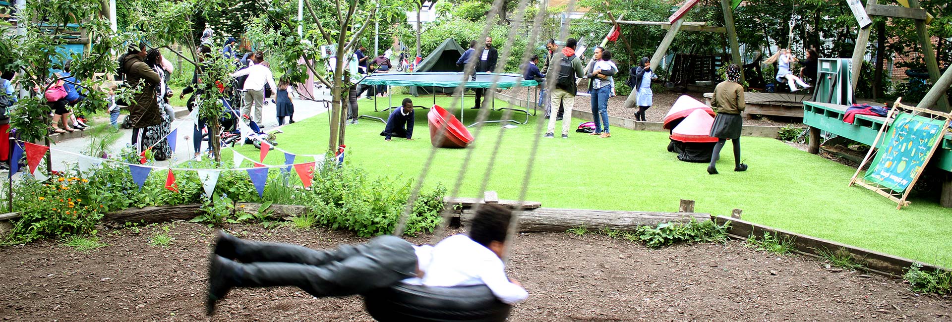 Image of children enjoying the facilities at the Triangle Adventure Playground