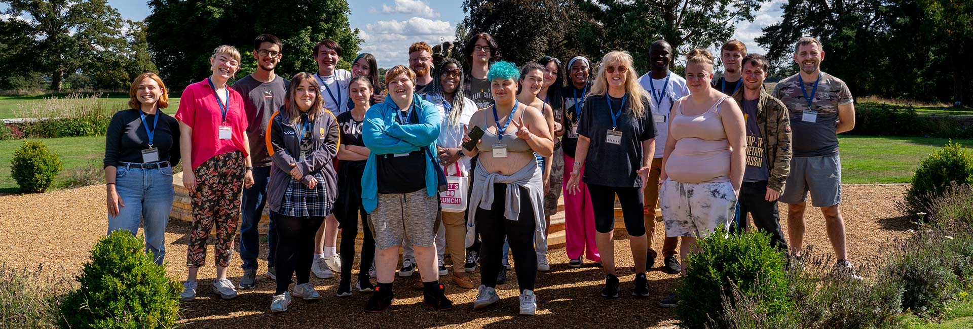 An image of people from The Foyer Federation standing outside in a garden