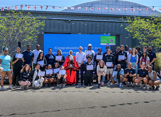 Group photo of participants and representatives for The Green Quarter Street Elite Graduation Ceremony, in Ealing.